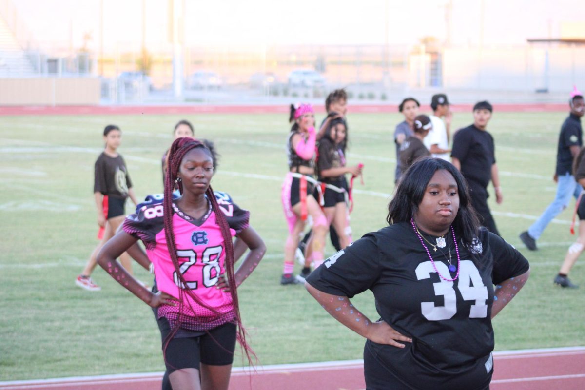 Sunett'z members Ramiyah Tenison (left) and Jalynn Hammond perform during halftime at Del Oro's first Powder Puff game in May. The club was the first and only majorette dance team in the Kern High School District until it was disbanded in late August.