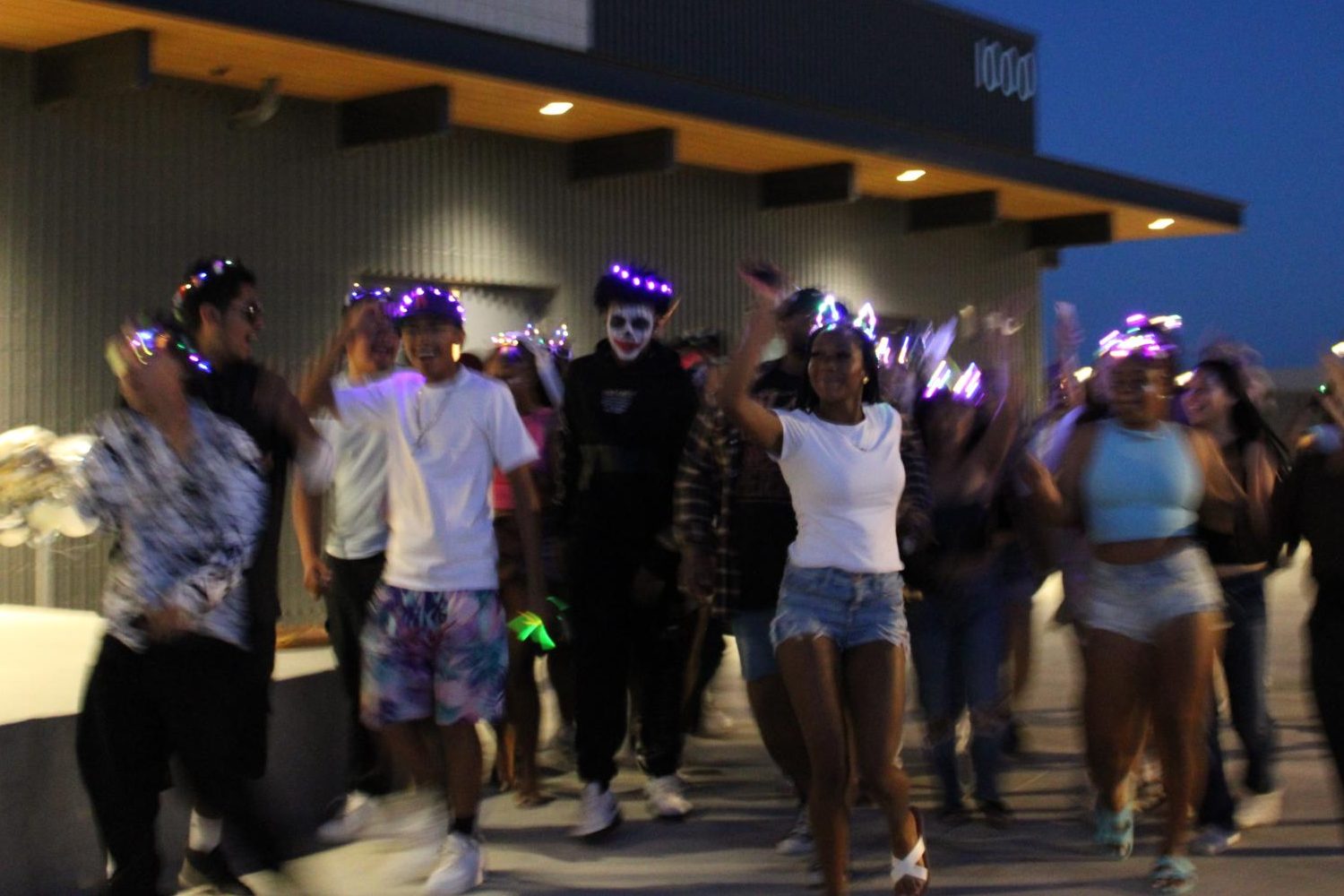 Rayannah Ward (center) leads the way to front of the stage during Fridays Sunchella.