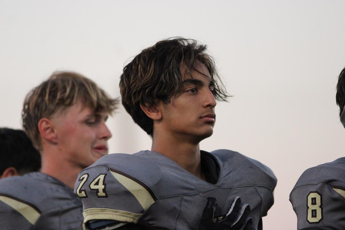 It's a quiet moment during the national anthem for wide receiver Adrian Gracian.