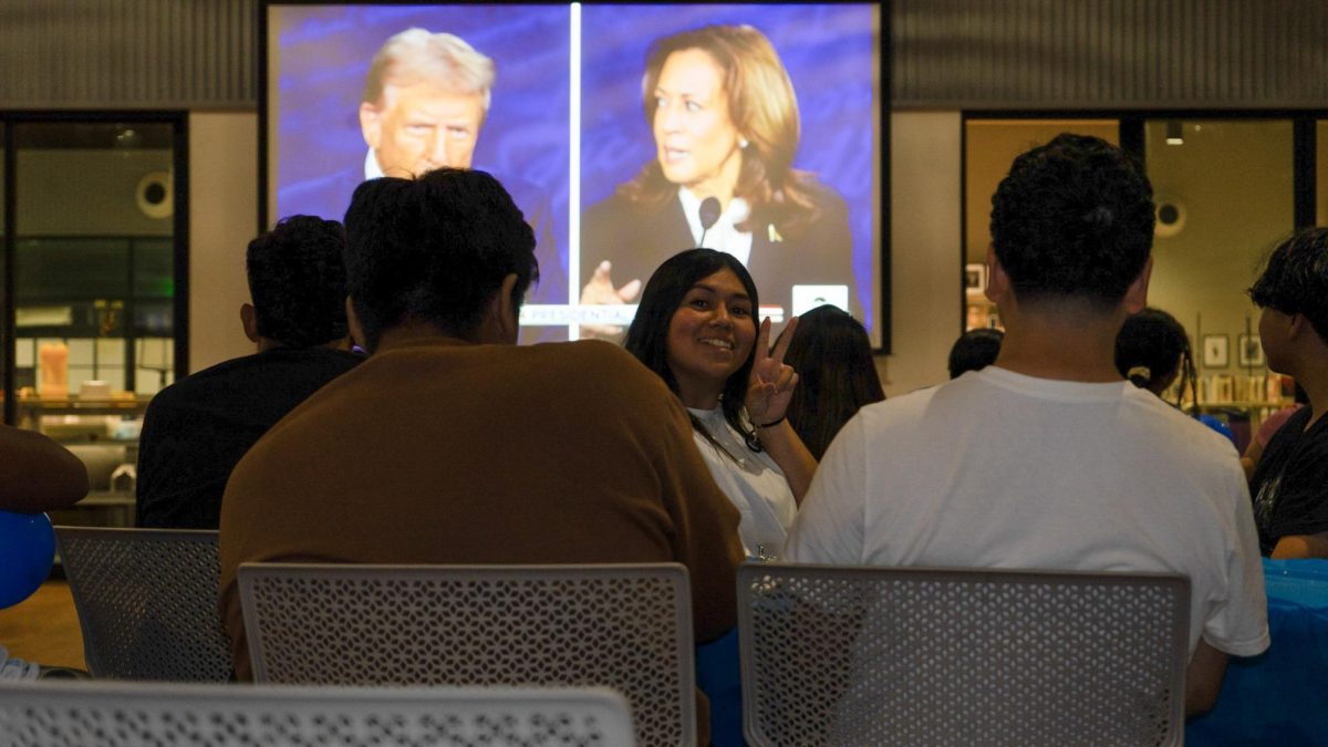 Genessis Lopez-Corvera (center) was among the many seniors who watched the presidential debate between Republican candidate Donald Trump and the Democratic nominee, Vice President Kamala Harris. 