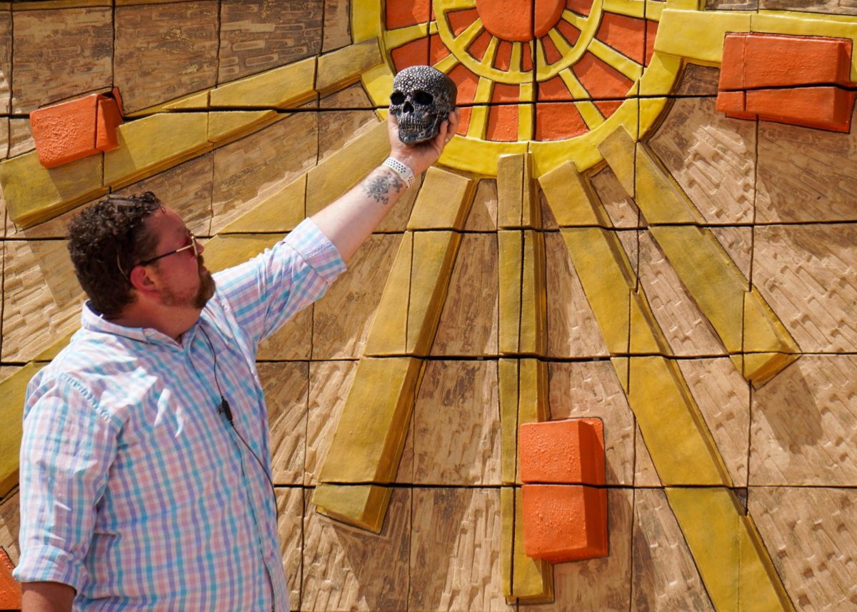 Alas, poor Yorick! Dean of Students Justin Brooks shows off the acting skills that earned him the superlative of Best Thespian during his senior year.