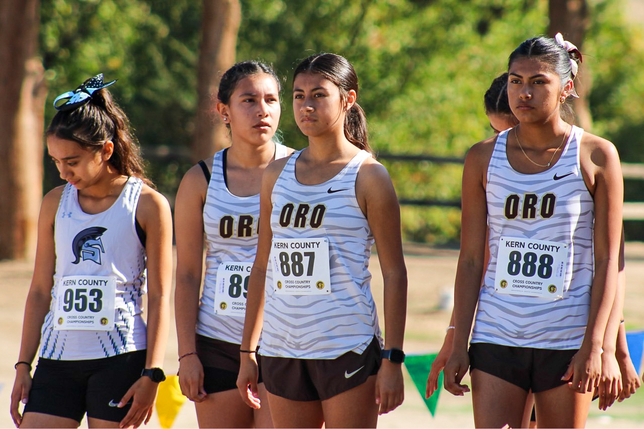 Senior Sonia Alba (center), captured third place at the South Yosemite Horizon League championships. Alba is shown with teammates Valerie Vargas (left) and Leslie Moreno at last week's Kern County Championships at Hart Memorial Park.