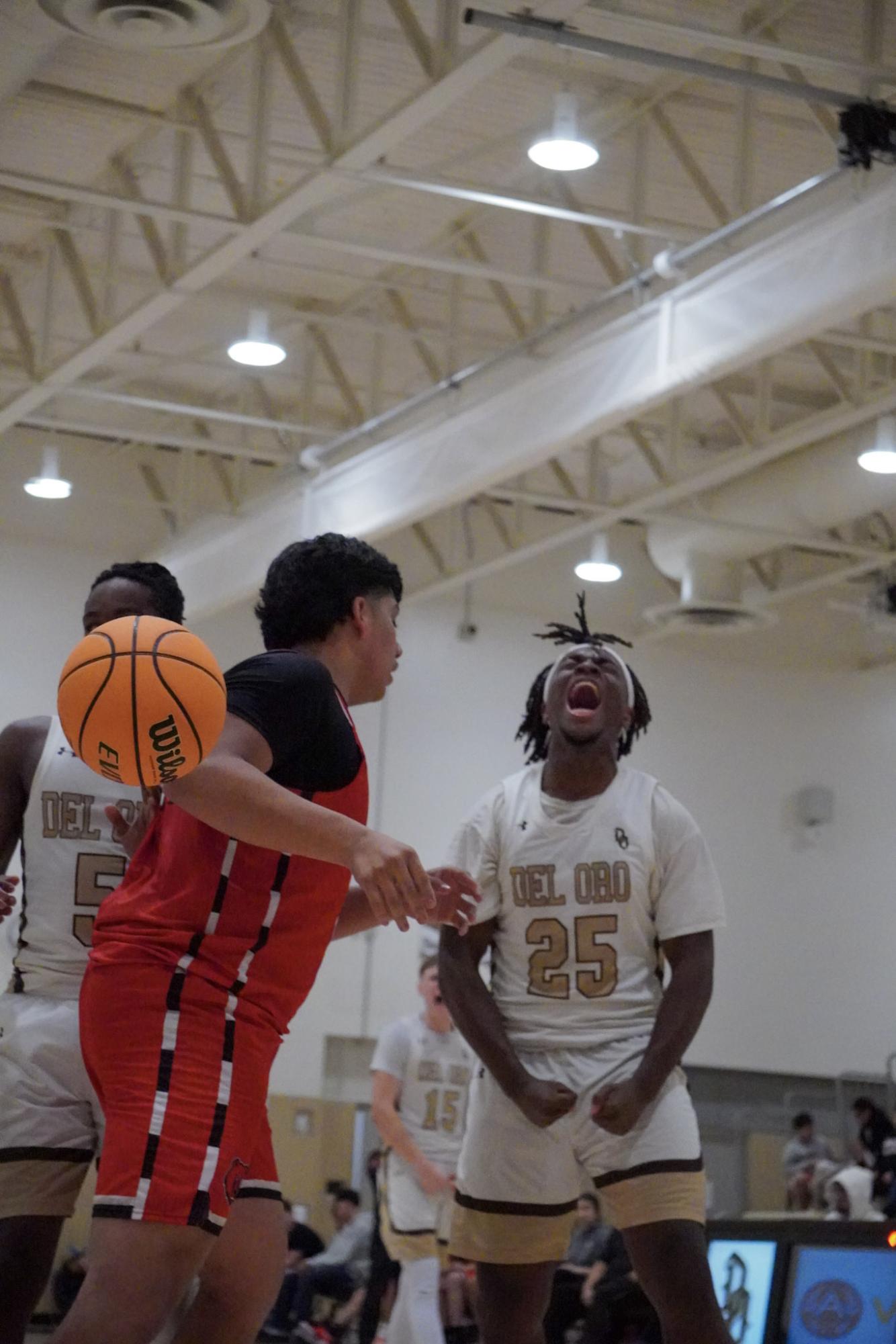 Del Oro's Jacob Cantley (right) gets emotional during the Suns' 68-41 win over Arvin on Thursday.