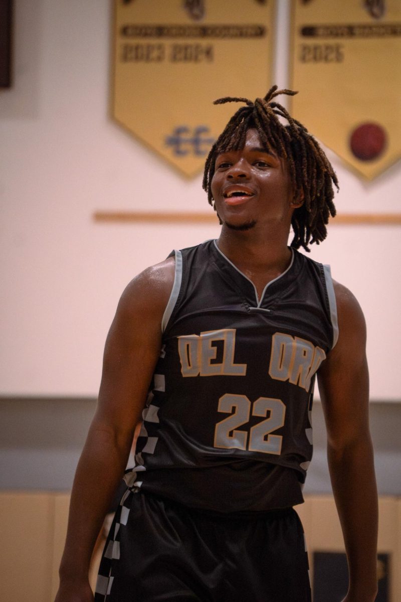 Jacob Cantley smiles after shooting a successful free throw during Tuesday's game against Mira Monte.